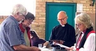PictureBishop Kate inducting  Ian and Judi as new members of the Anglican Church, and Rev Charles Potter.